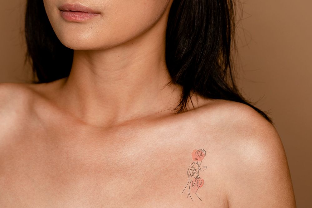 Minimal collar bone tattoo on woman