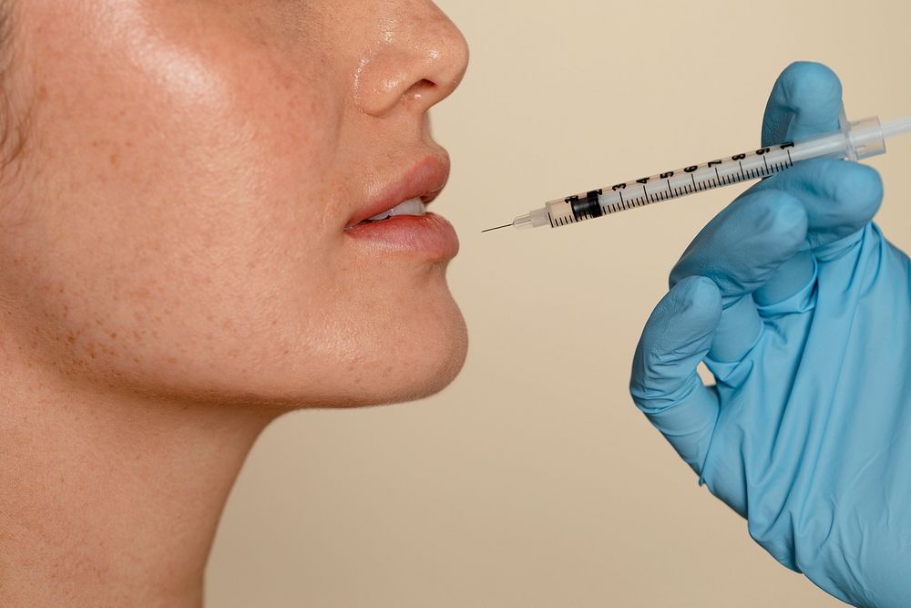 Lip filler, injectable beauty treatment at clinic 