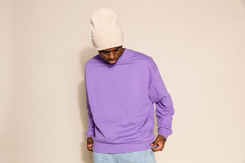 Black man in trendy purple outfit