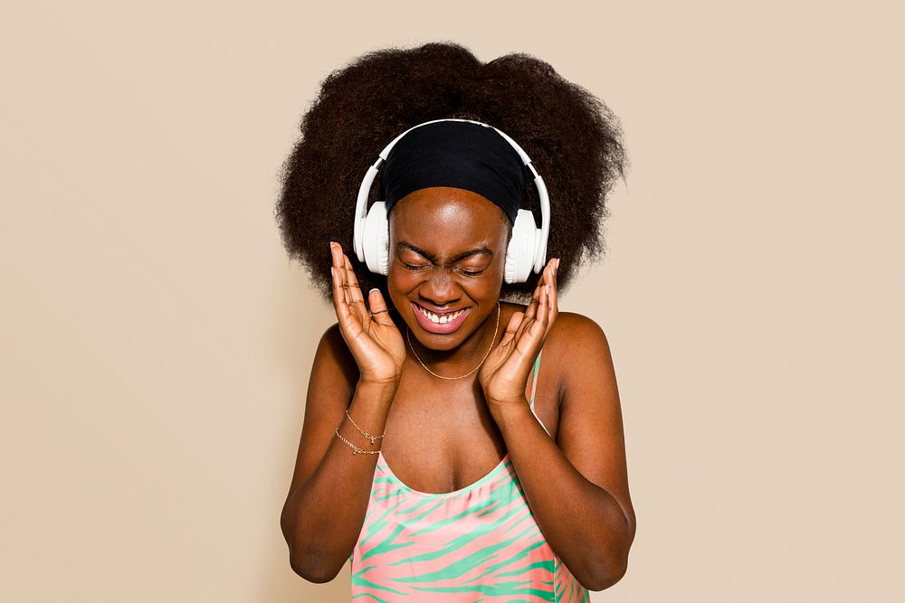 Woman enjoying music in headphones