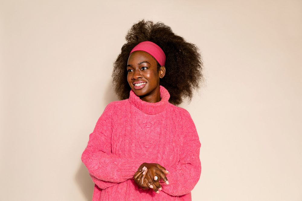 Black woman in pink knitted sweater 