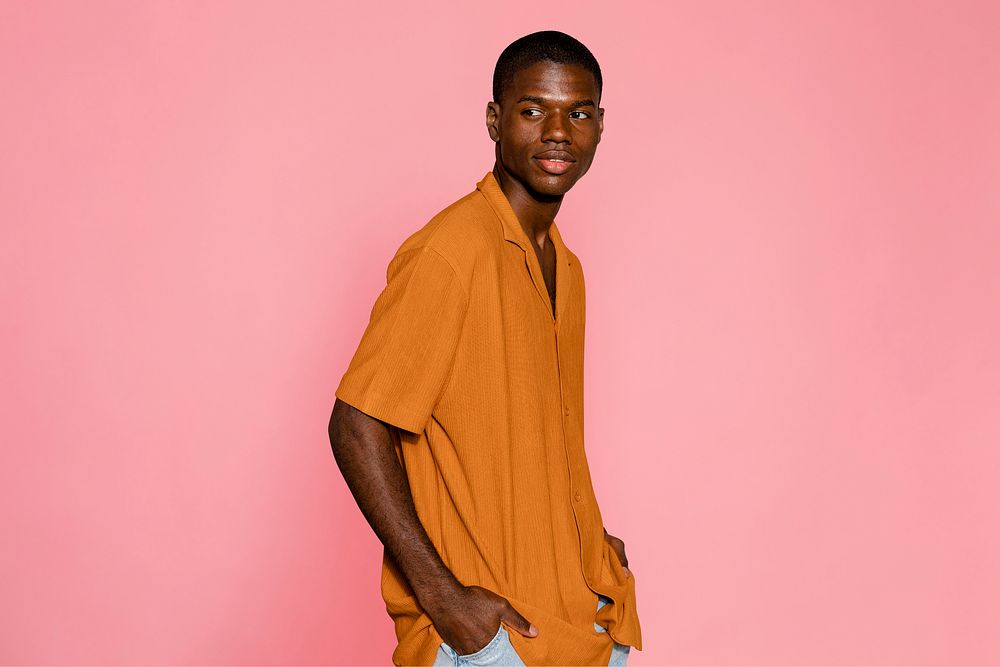 Man wearing orange short sleeve shirt
