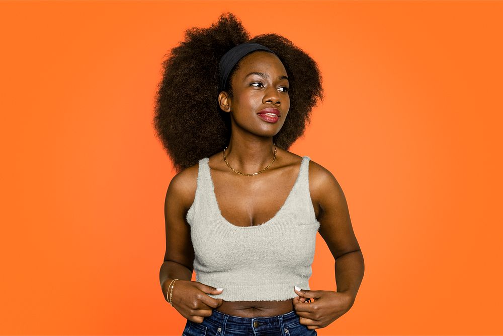 African American woman on orange background
