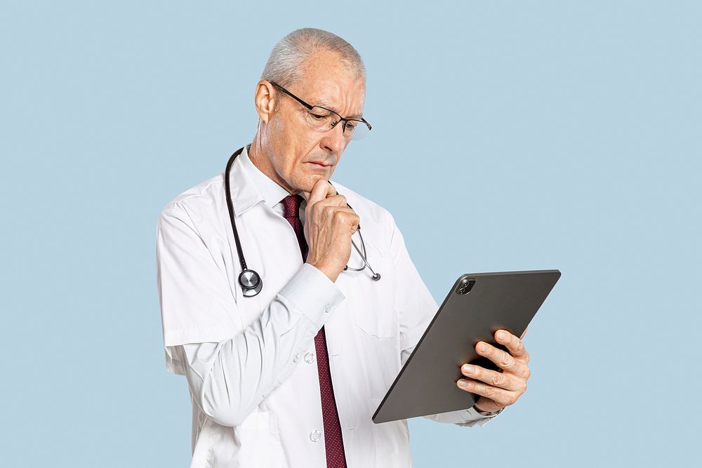 Male doctor mockup psd using a tablet