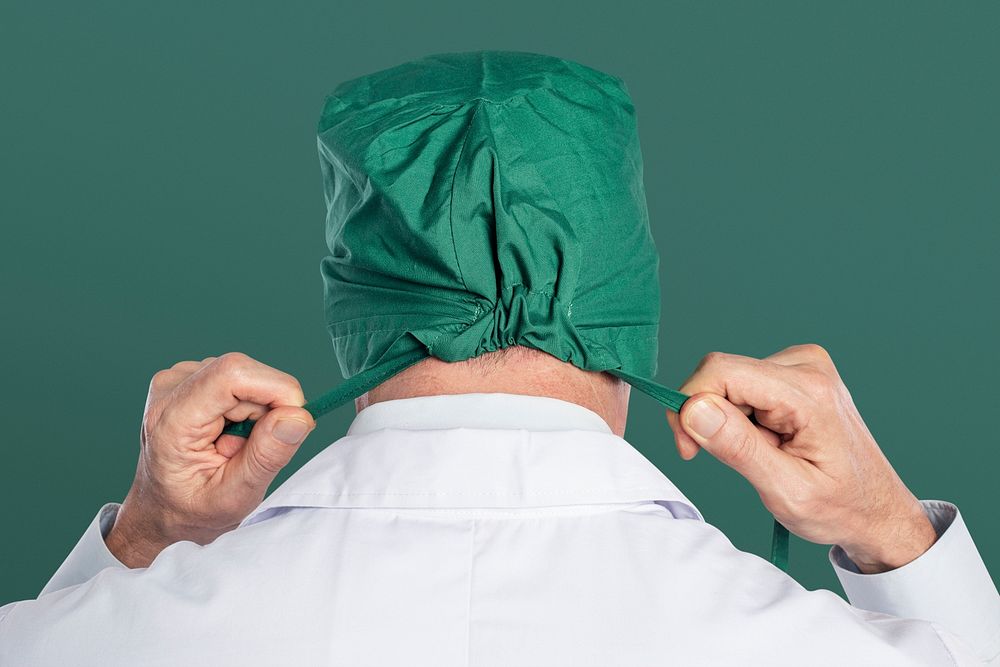 Male surgeon mockup psd wearing a green surgical cap