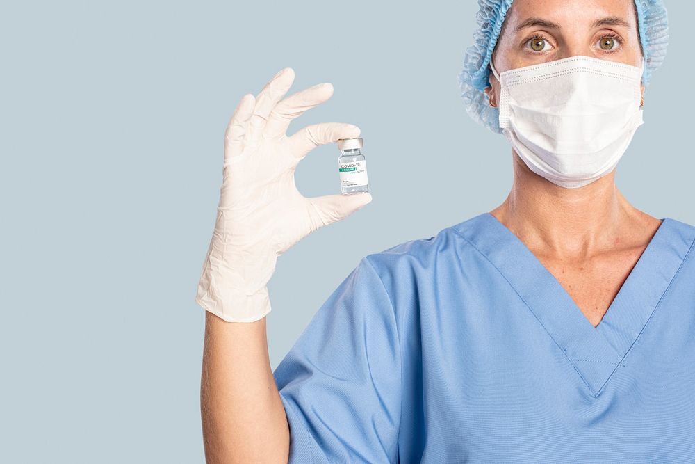 Vaccine bottle mockup psd in doctors hand