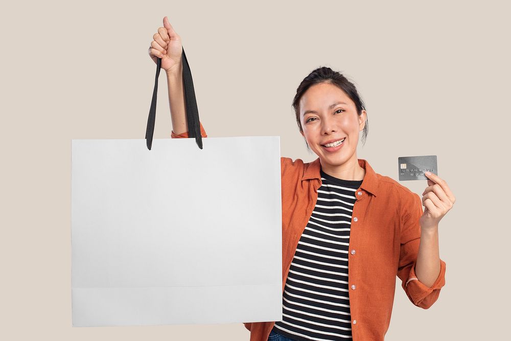 Woman with a white shopping bag with design space
