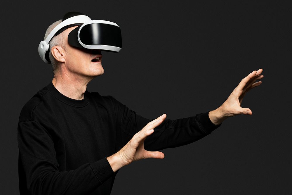 Mature man experiencing VR entertainment technology