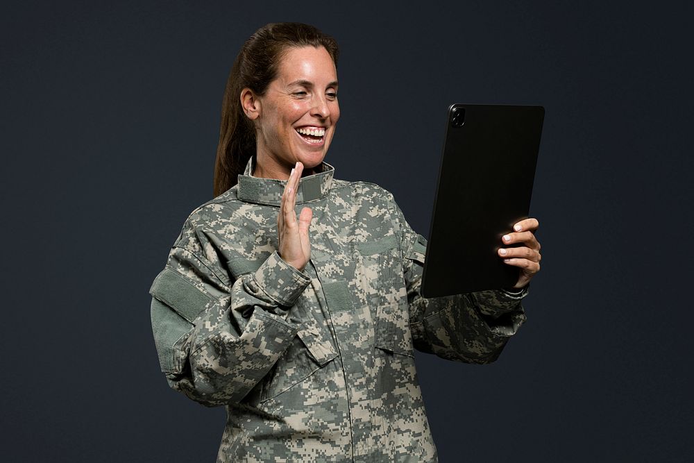 Female soldier using a tablet army technology