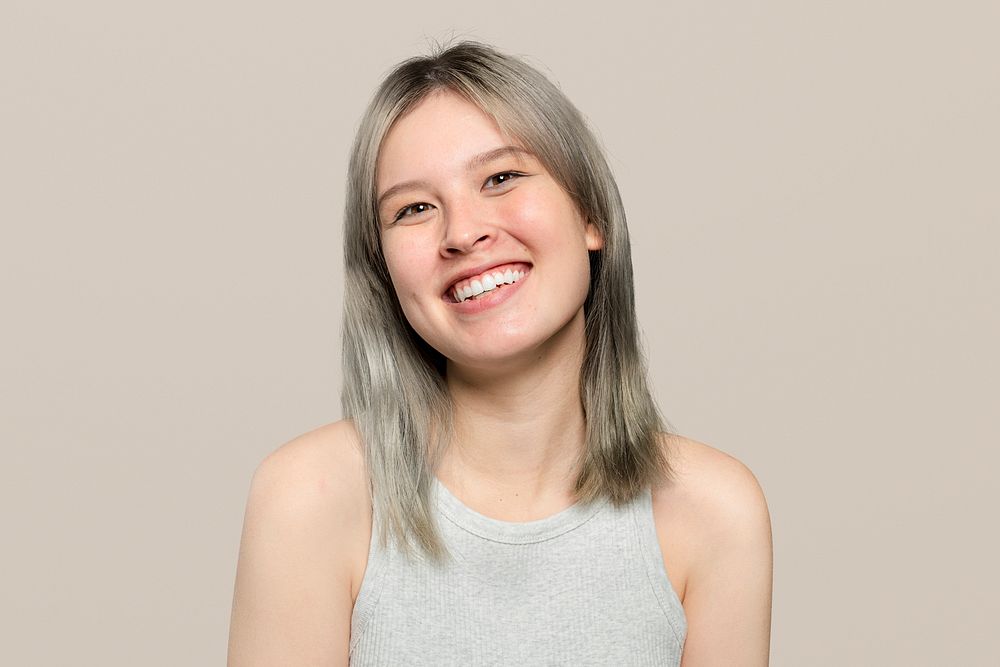 Cheerful woman mockup psd in a beige tank top