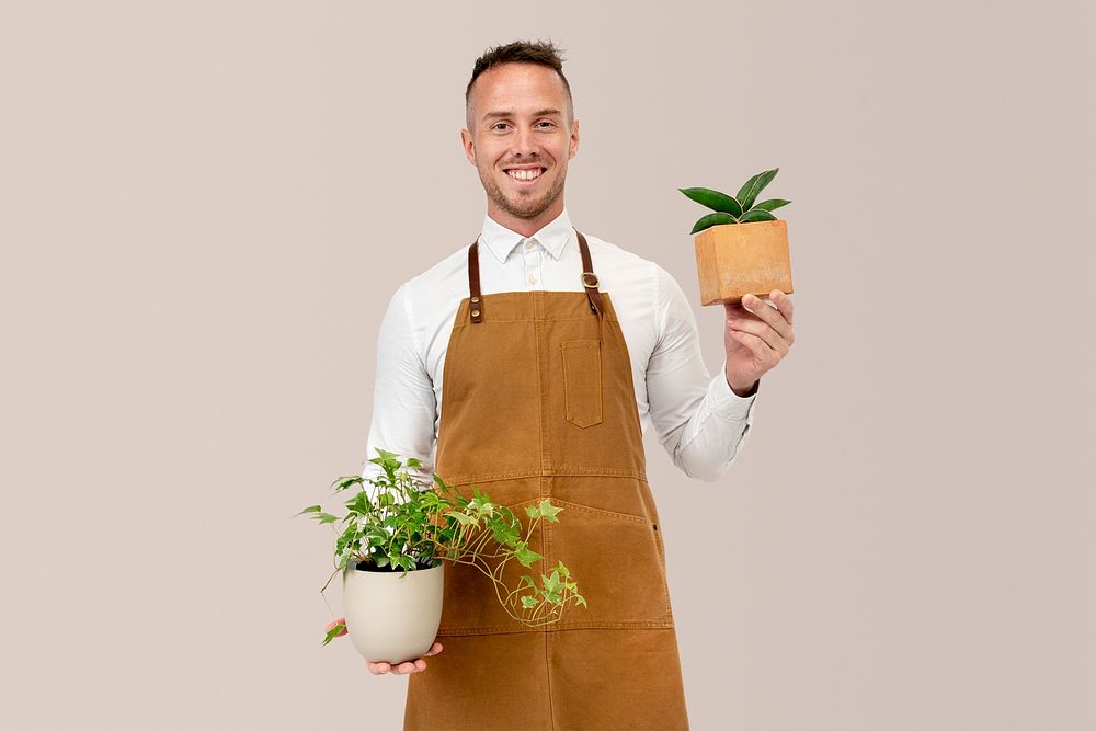 Plant shop owner mockup psd holding houseplants