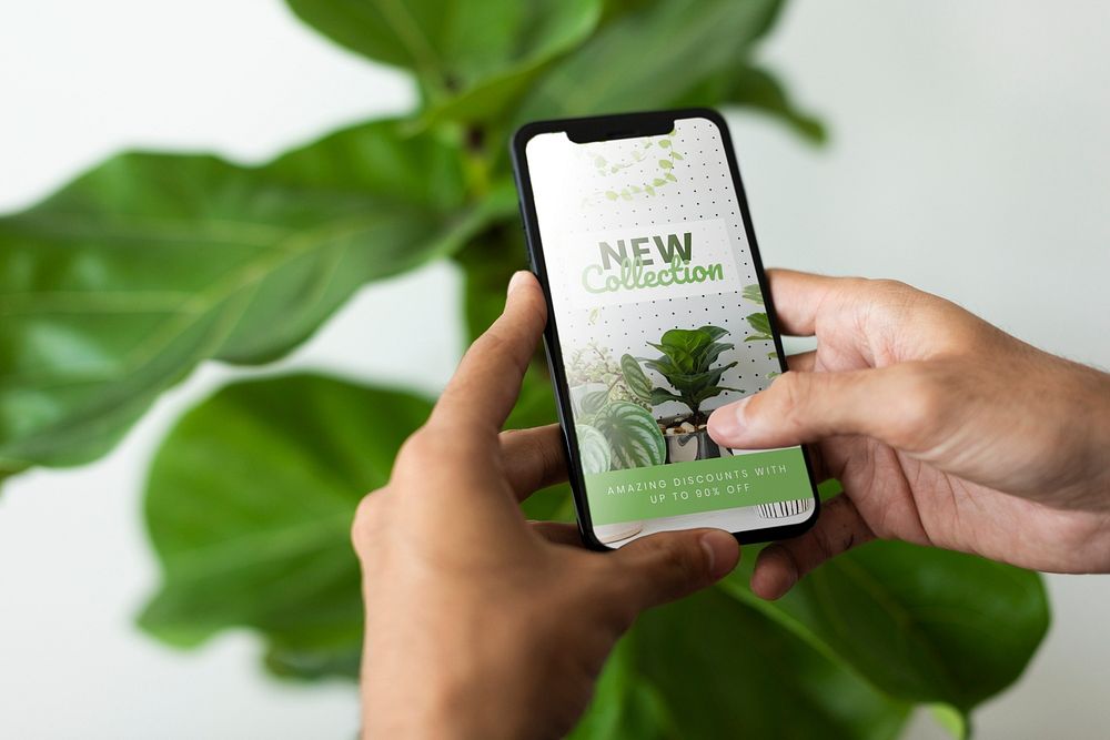 Phone screen mockup psd in with online houseplant shop ads
