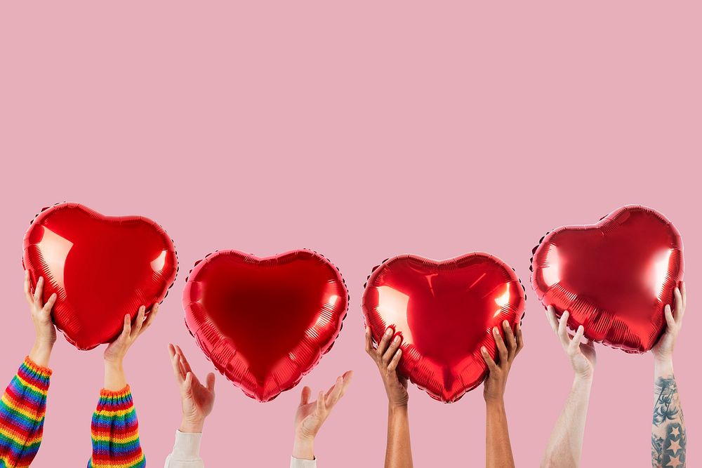 People holding hearts for Valentines&rsquo; celebration