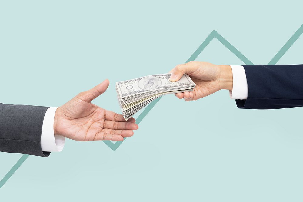 Business proposal purchase hands holding money