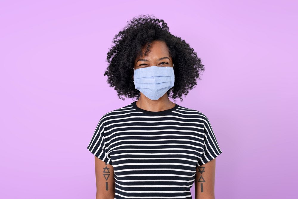 African woman mockup psd wearing face mask in the new normal