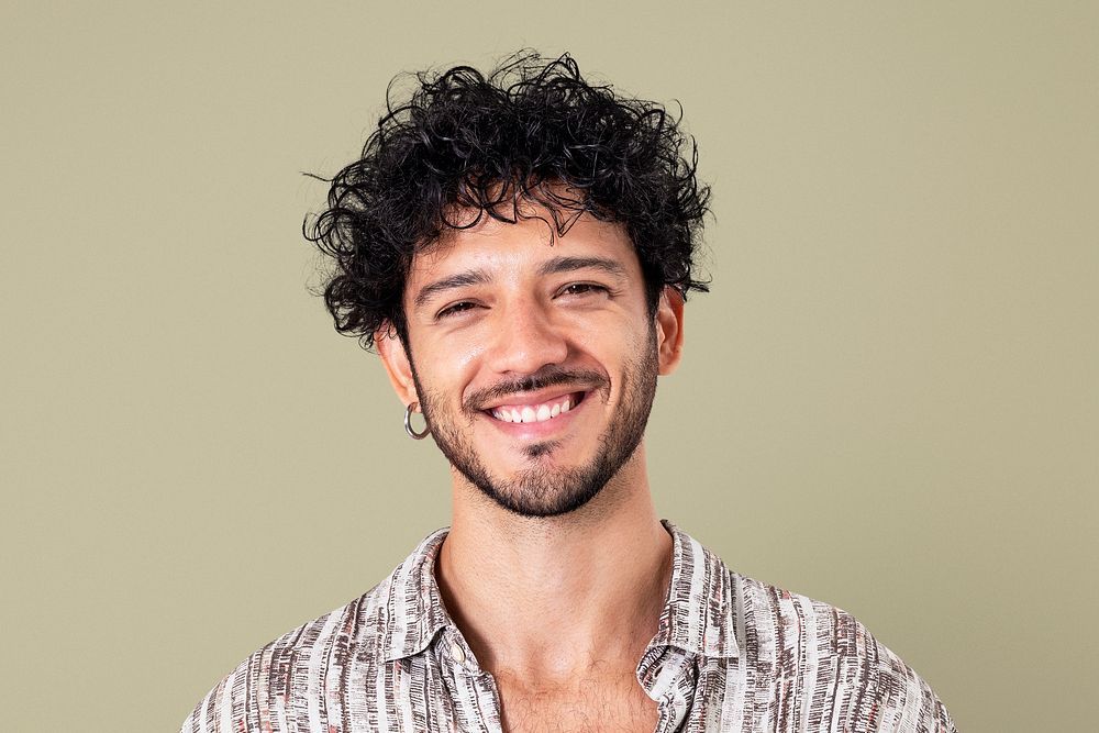Latin man smiling cheerful expression closeup portrait