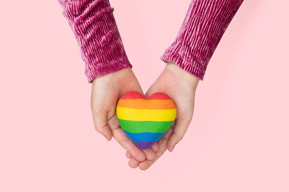 LGBTQ+ community heart mockup psd with hands presenting