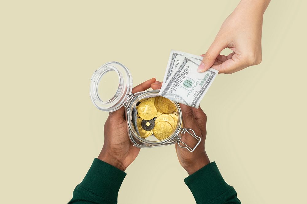 Money jar mockup psd held by hands finance savings concept