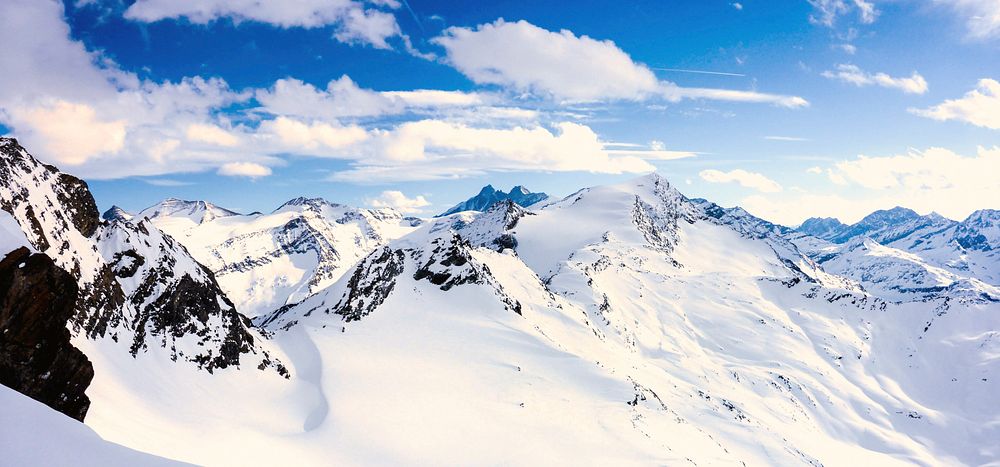 Snowy mountain range. Original public domain image from Wikimedia Commons