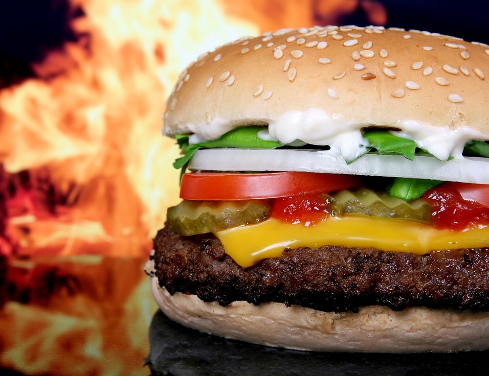 Close-up of a cheeseburger. Original public domain image from Wikimedia Commons