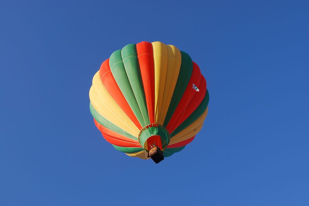 A hot air balloon in flight at the Mid-Hudson Valley balloon festival along the Hudson River in Poughkeepsie, New York.…