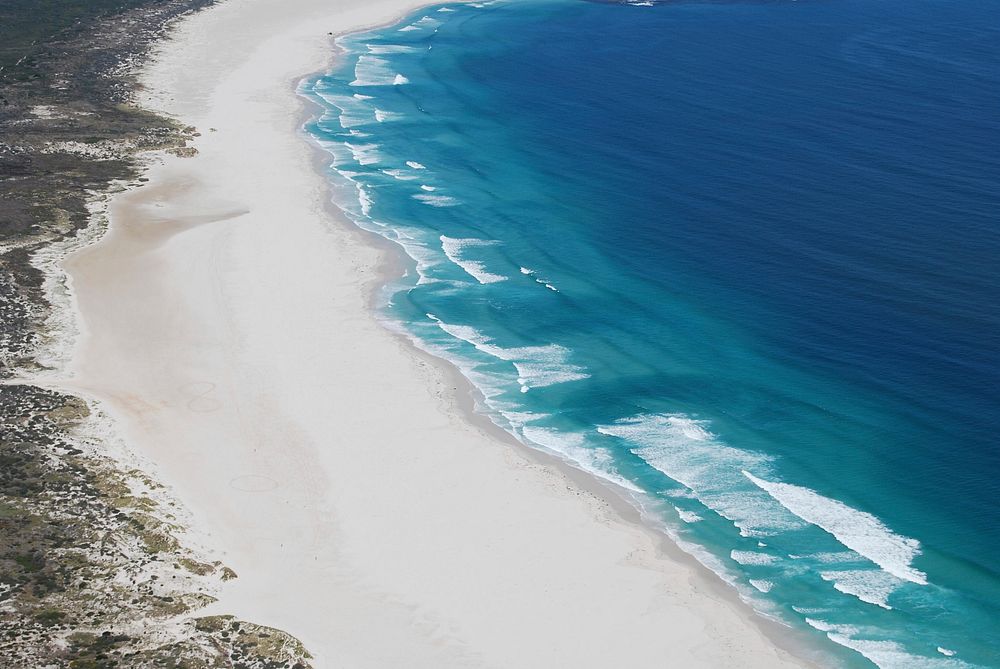 Peaceful scenic beach. Original public domain image from Wikimedia Commons