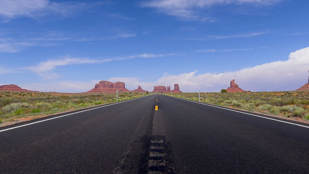 Driving Through Monument Valley. Original public domain image from Wikimedia Commons