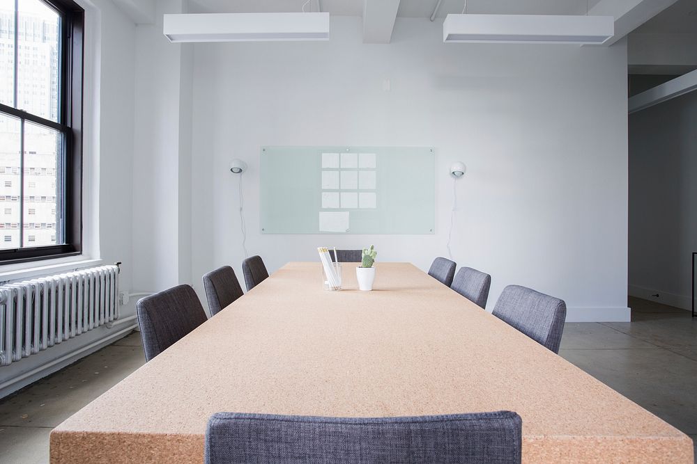 A conference room with table and chairs. Original public domain image from Wikimedia Commons