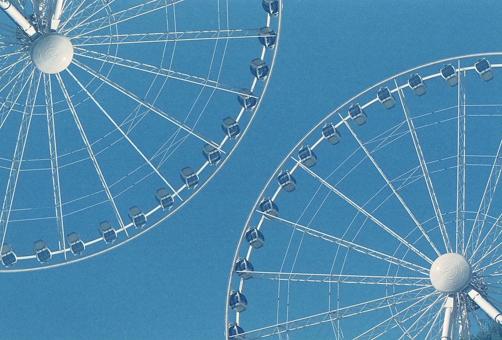 Ferris wheels. Original public domain image from Wikimedia Commons