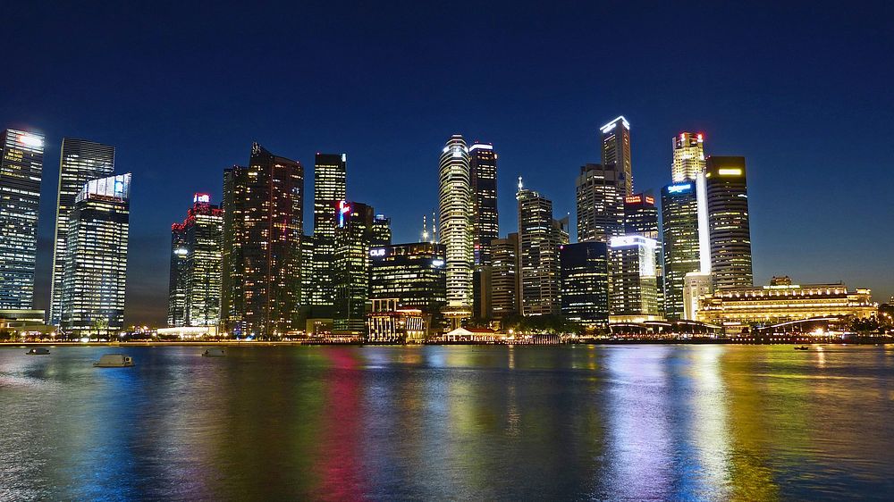 The skyline of the Central Business District of Singapore seen from across Marina Bay. Original public domain image from…