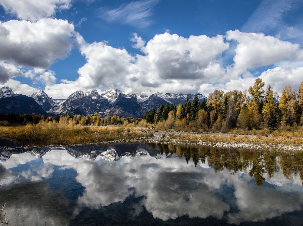 The majestic peaks of the Teton Range reflect in a mountain stream in Grand Teton National Park in northwestern Wyoming.…