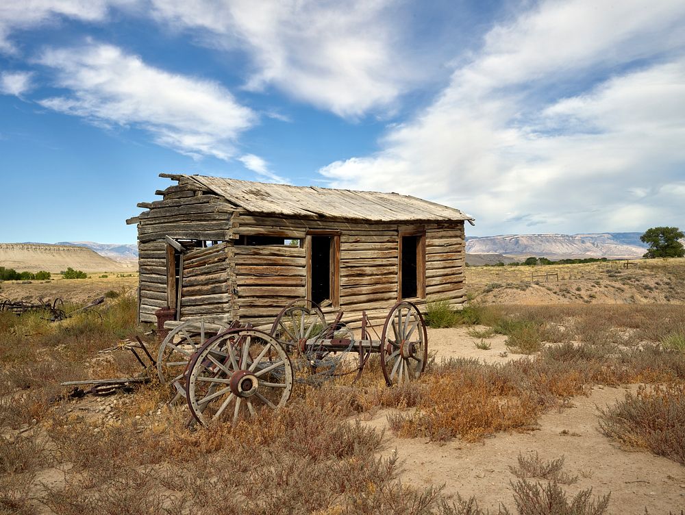 Old cabin and buckboard wheels in Big Horn County, Wyoming. Original image from Carol M. Highsmith&rsquo;s America, Library…