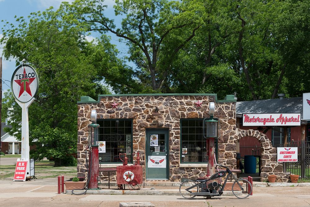 An old gas station (converted to a motorcycle shop) in Jefferson, a town in Marion County in East Texas on whose main street…
