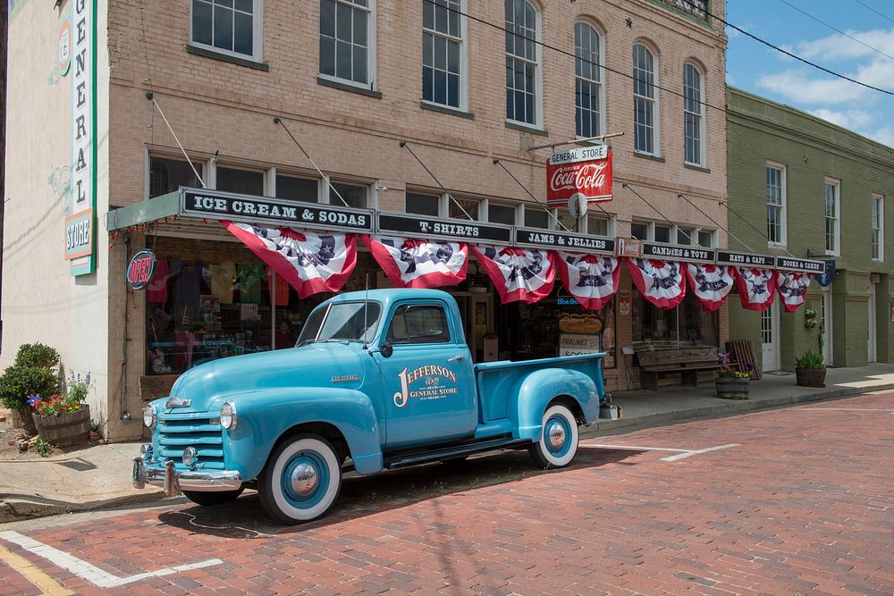 A 1950s-vintage truck outside a general store in Jefferson, a town in Marion County, Texas. Original image from Carol M.…