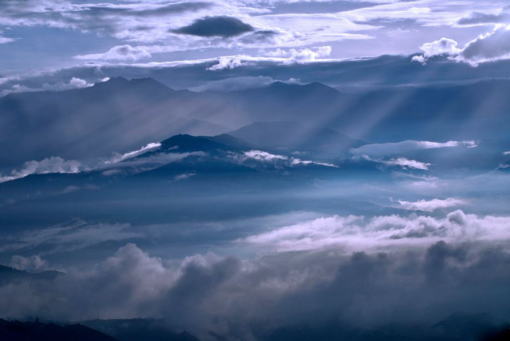 Heavenly sky & mountain background. Original public domain image from Wikimedia Commons