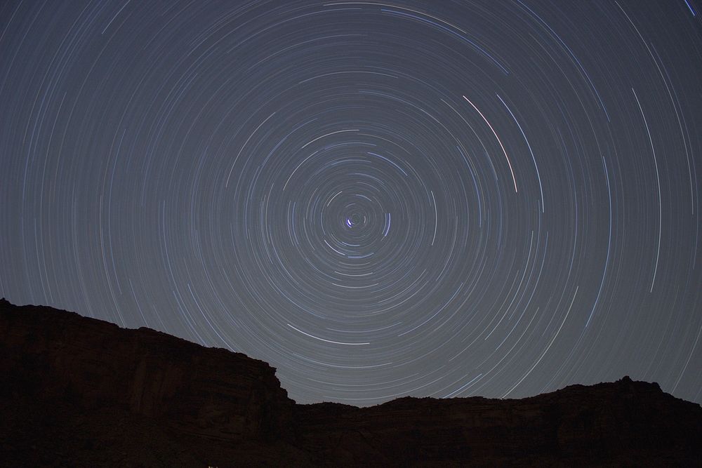 Starry sky and mountains. Original public domain image from Wikimedia Commons