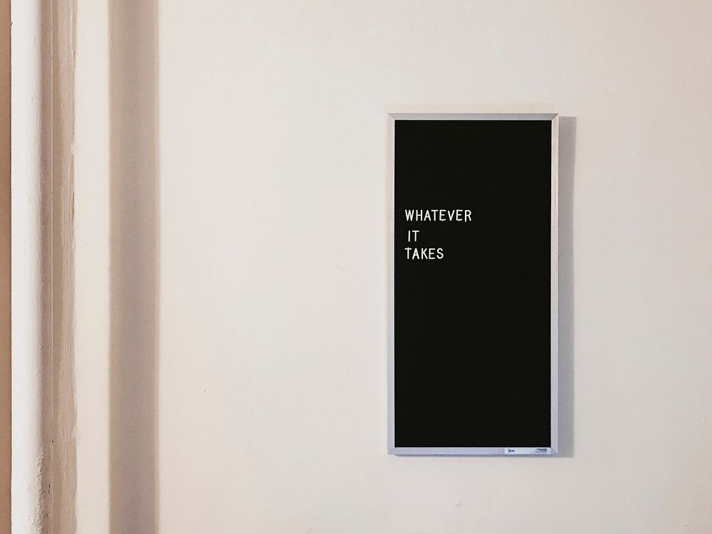 Minimal frame with quote hanging on the wall. Original public domain image from Wikimedia Commons