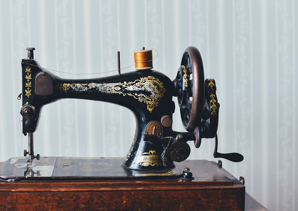 Vintage sewing machine. Original public domain image from Wikimedia Commons