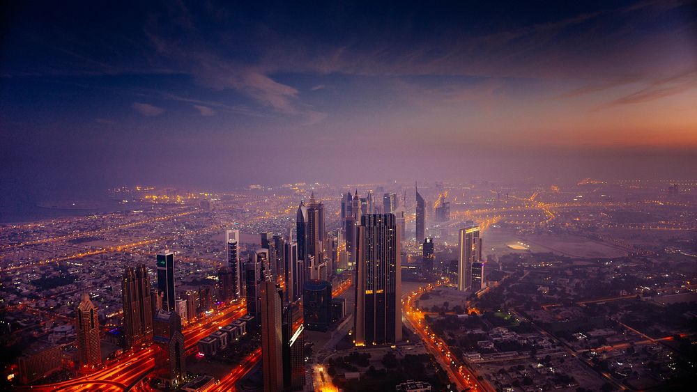 Dubai at sunrise. Original public domain image from Wikimedia Commons