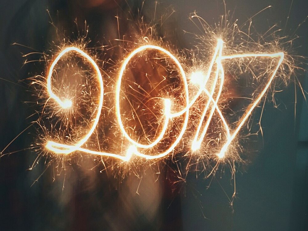 The year 2017 written in sparklers at new year's eve. Original public domain image from Wikimedia Commons