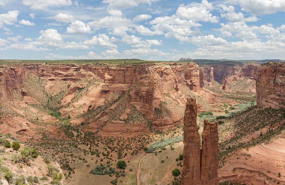 A spectacular view of the inside of a canyon under a cloudy sky. Original public domain image from Wikimedia Commons