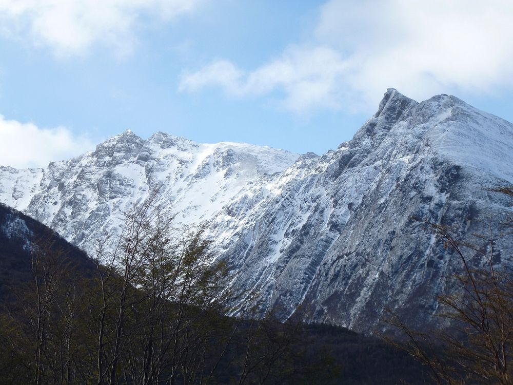 A rugged Alpine mountain ridge. Original public domain image from Wikimedia Commons