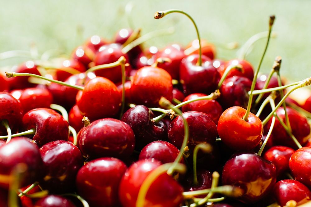 Pile of fresh bing cherries with long stems. Original public domain image from Wikimedia Commons
