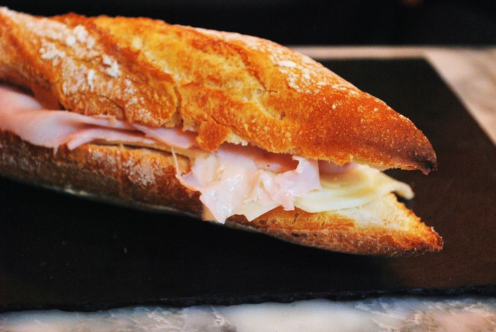 Ham and cheese sandwich on a baguette. Original public domain image from Wikimedia Commons