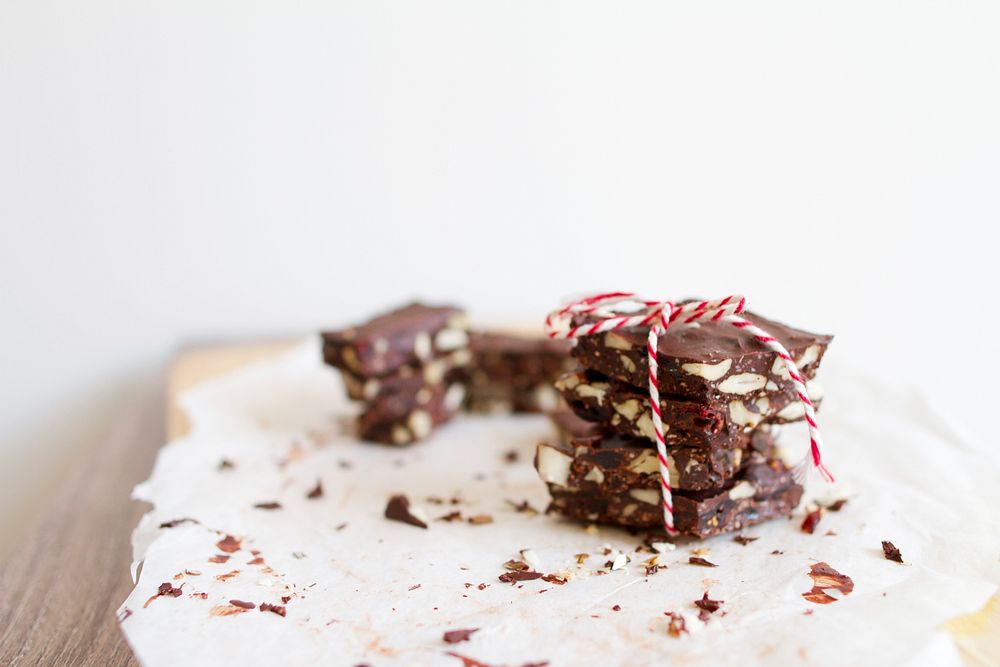 Peppermint, nut, chocolate bark tied together with red and white bakers twine. Original public domain image from Wikimedia…