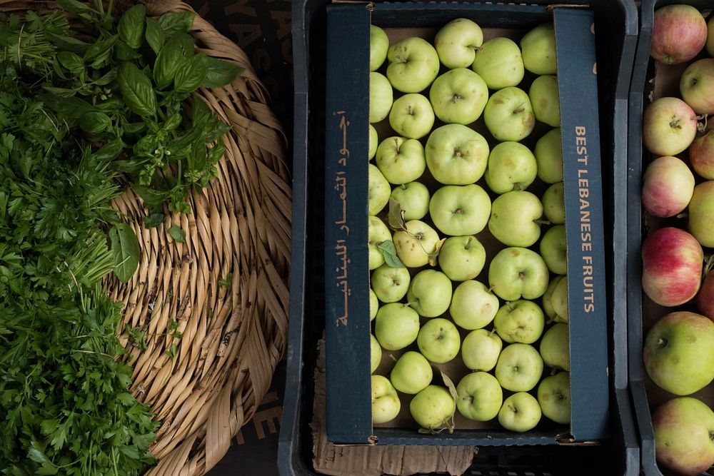 Apples and cilantro on display at a market at the Beirut City Center. Original public domain image from Wikimedia Commons