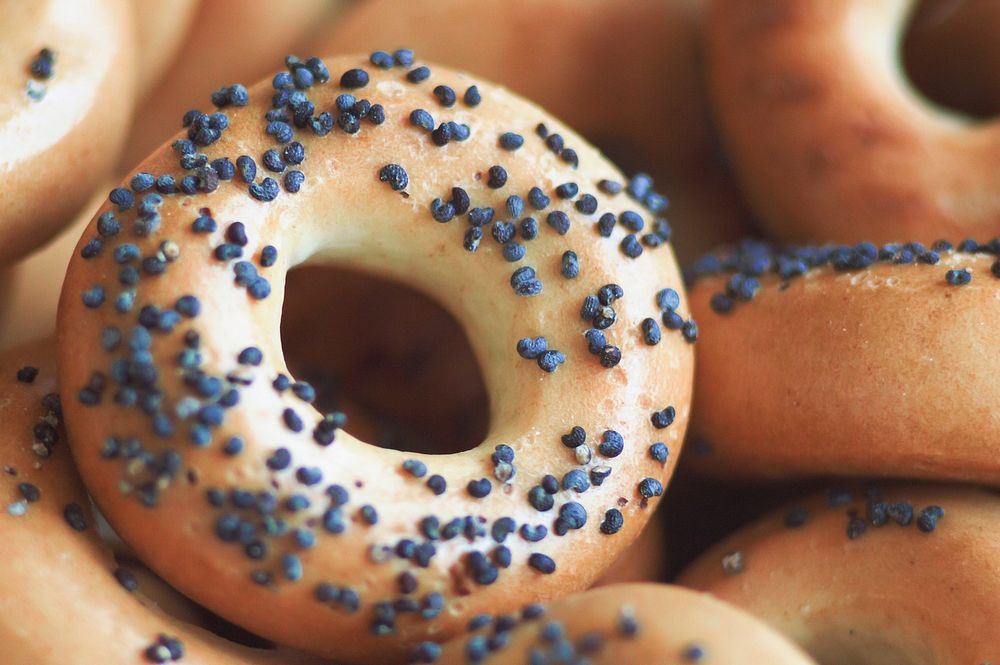 Macro shot of poppy seeds in a freshly baked bagel. Original public domain image from Wikimedia Commons