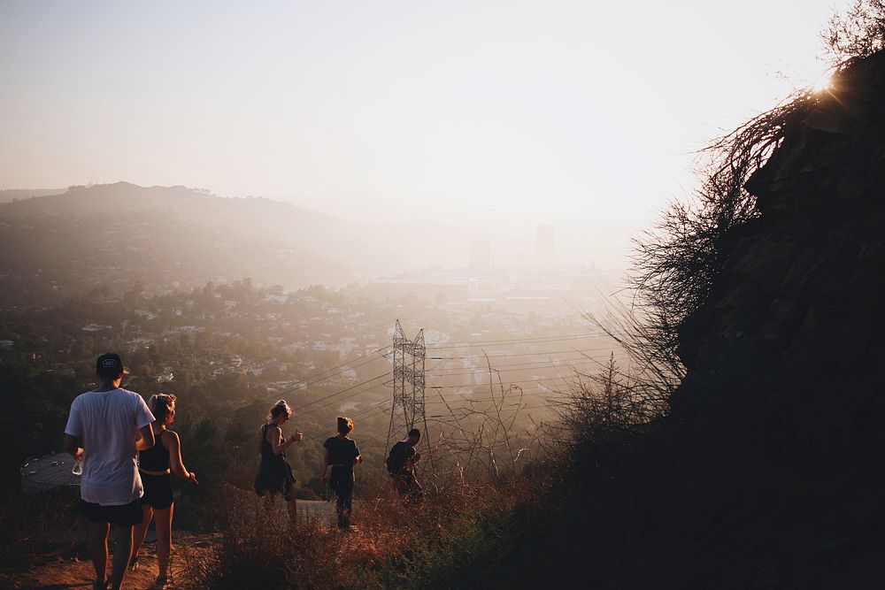 A group of friends hiking during sunrise or sunset in Los Angeles. Original public domain image from Wikimedia Commons