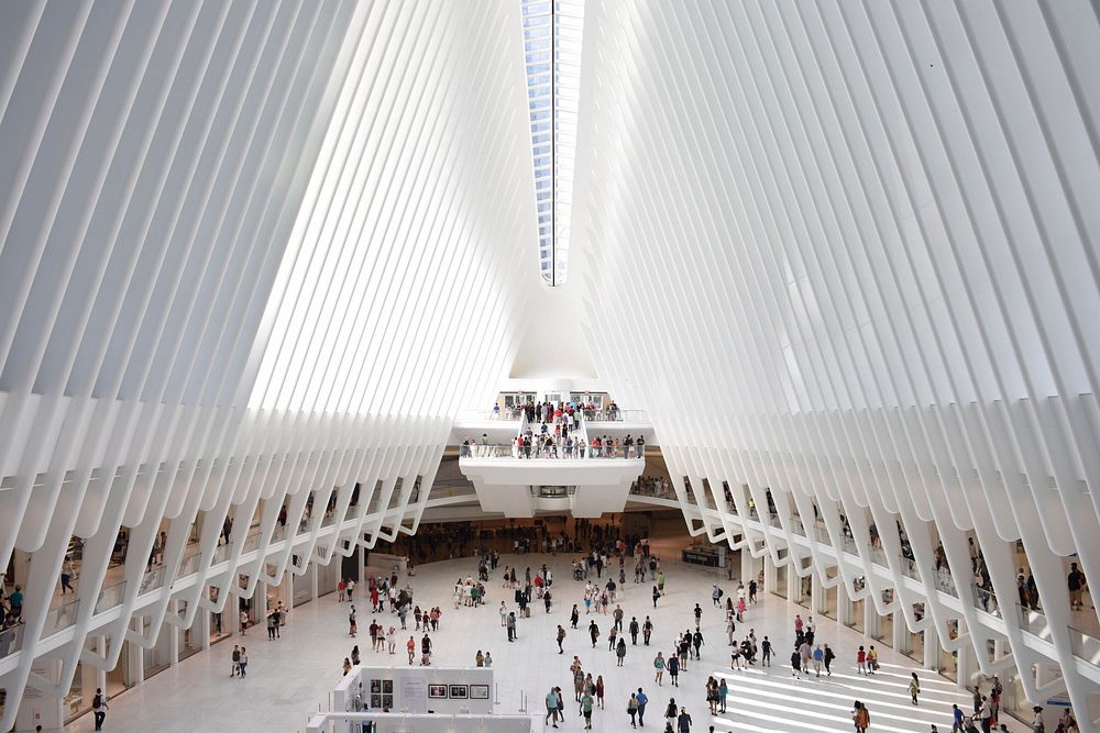 The crowded modern interior of the WTC Transportation Hub in New York City. Original public domain image from Wikimedia…