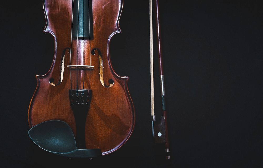An overhead shot of a violin and a string. Original public domain image from Wikimedia Commons